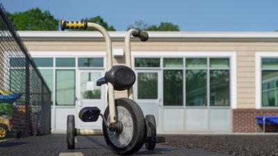 Tricycle in schoolyard
